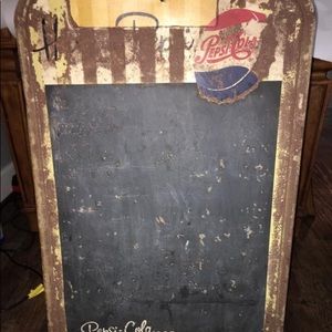 Very old tin Pepsi Cola chalkboard.